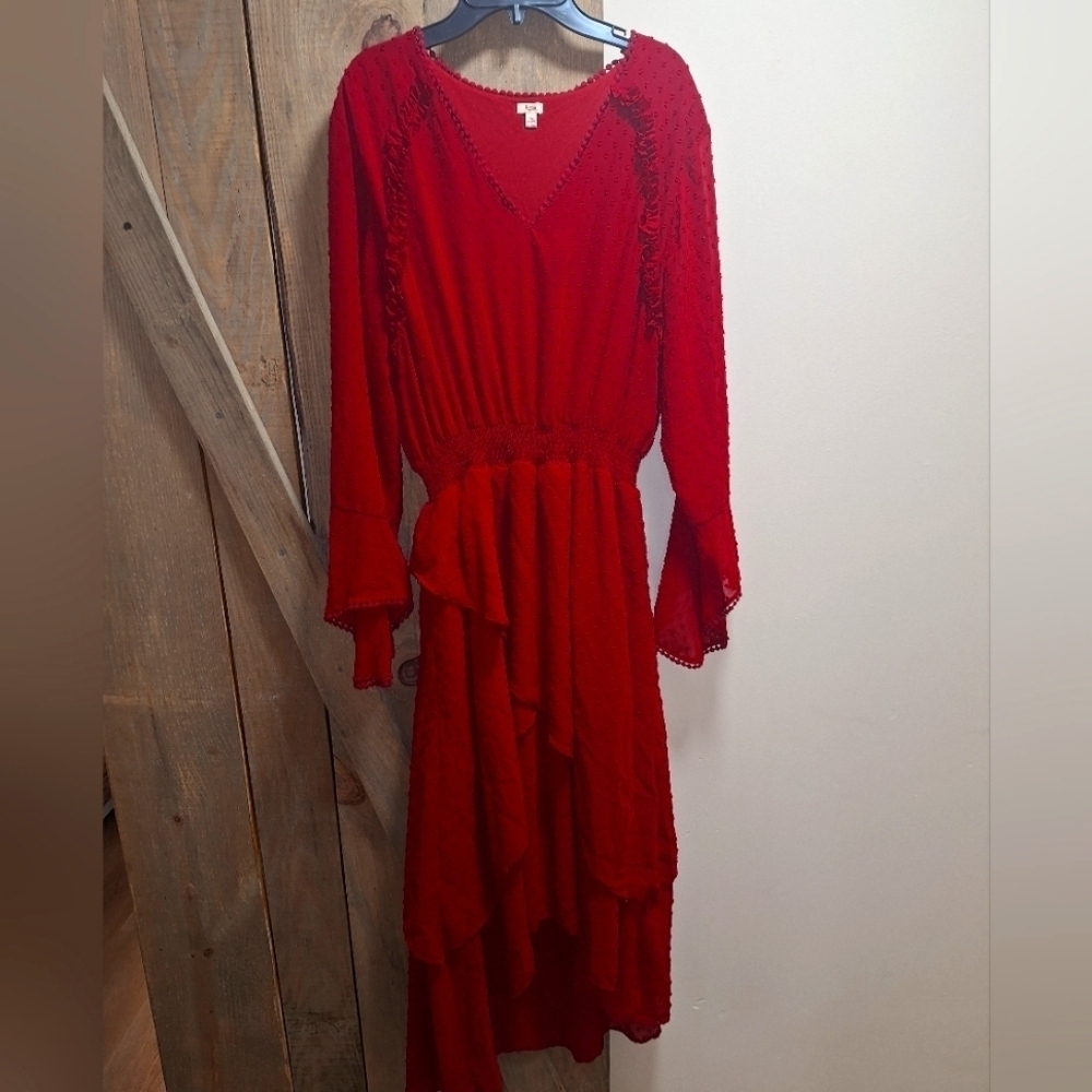 A red Reba tiered asymmetrical long sleeve maxi dress in a size XL. Pre-loved